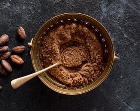 top view bowl with cocoa powder cocoa beans bubuk cokelat chocolazo web